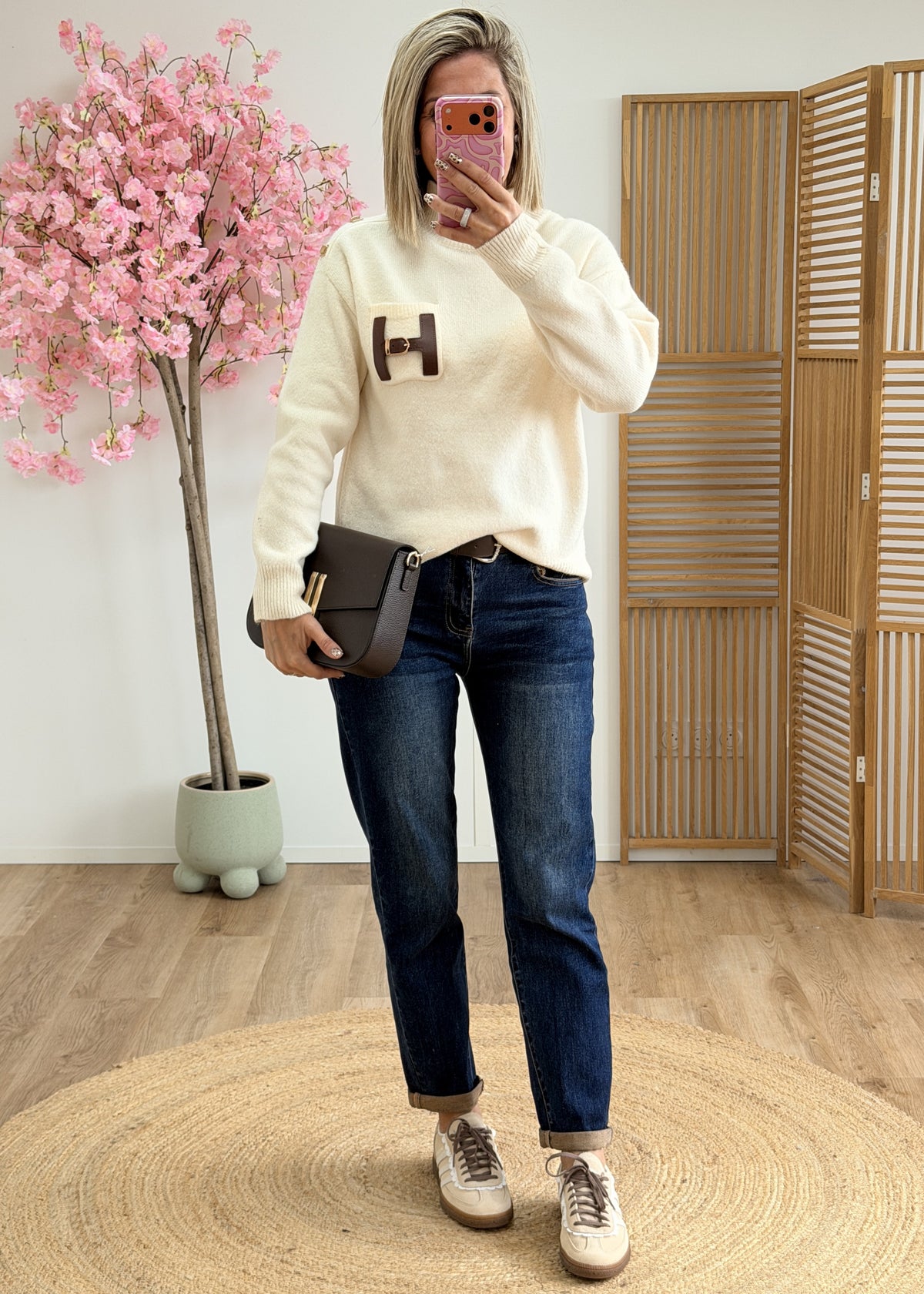 Pull col montant avec poche en simili cuir