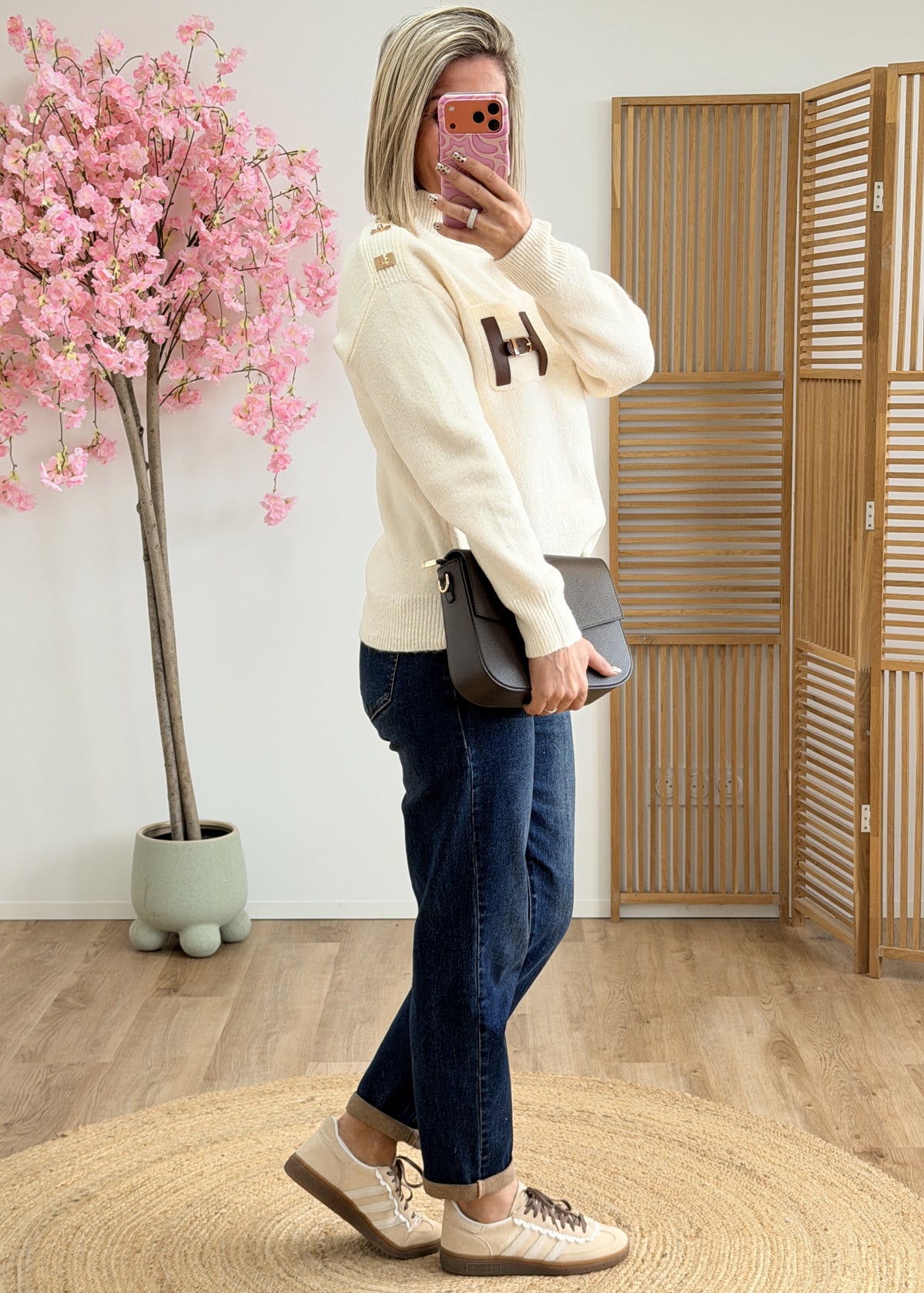 Pull col montant avec poche en simili cuir