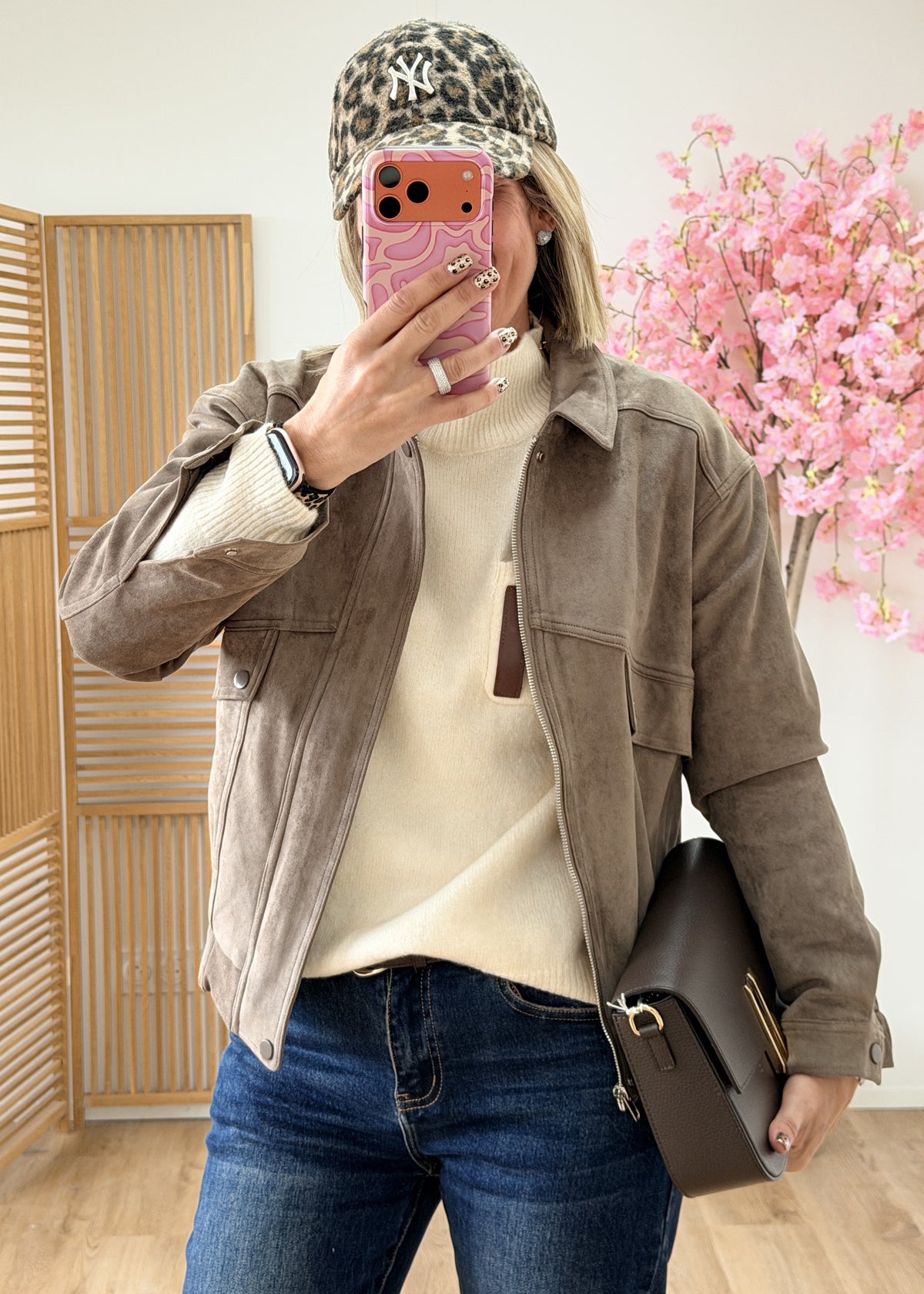 Pull col montant avec poche en simili cuir