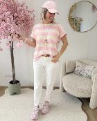 Pull en maille avec collier rose