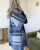 Poncho col roulé bleu