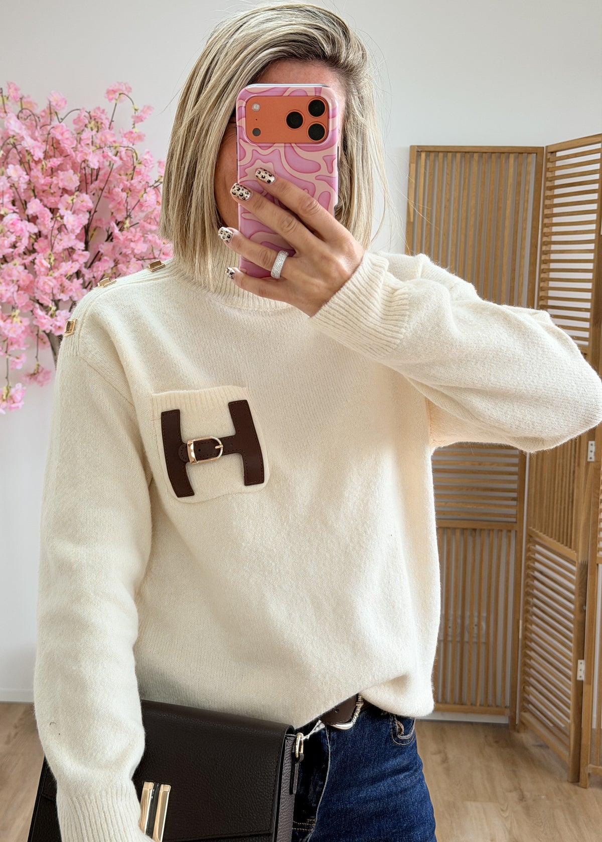 Pull col montant avec poche en simili cuir