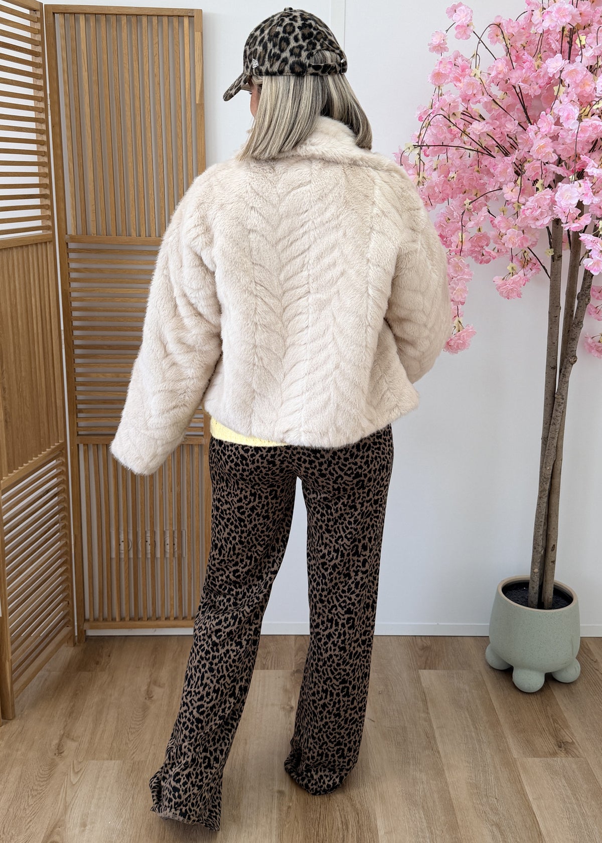 Manteau en fausse fourrure à boutons-pression