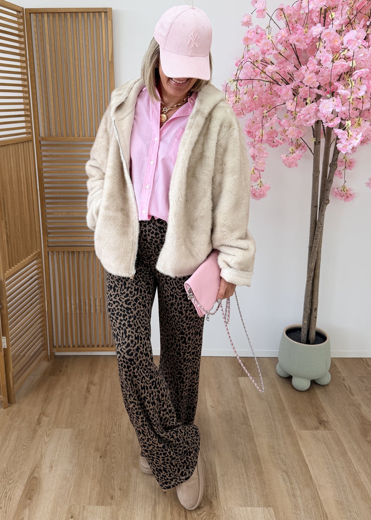 Manteau en fausse fourrure à capuche
