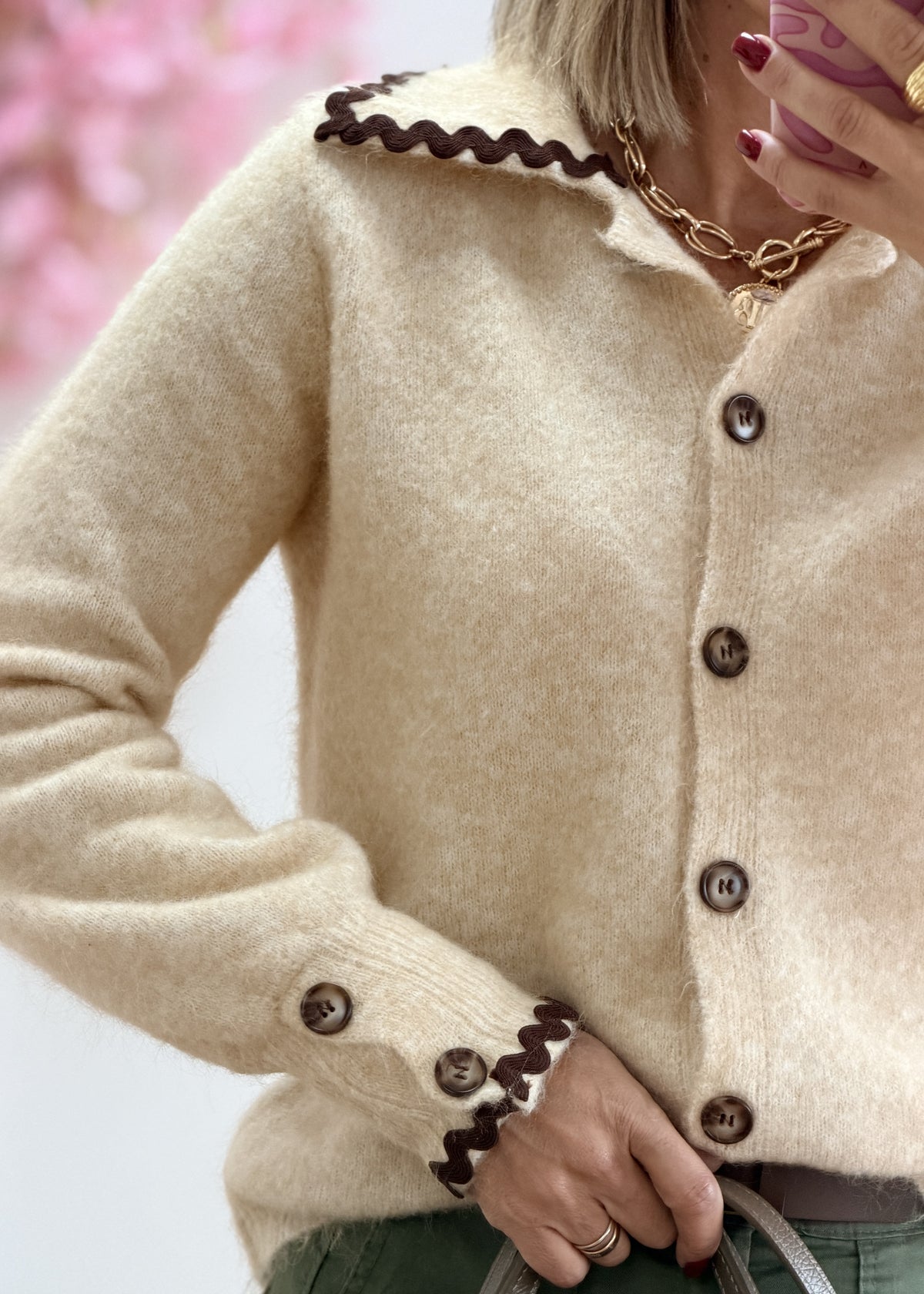 Gilet à col festonné et finitions contrastées
