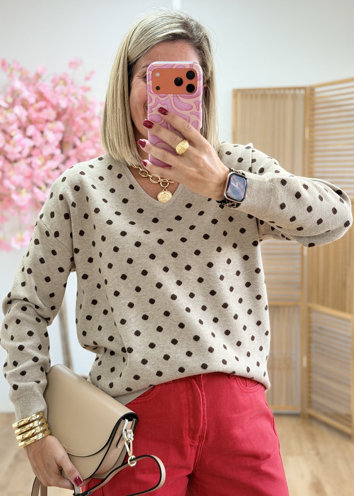 Pull à pois et cœur en dentelle au dos